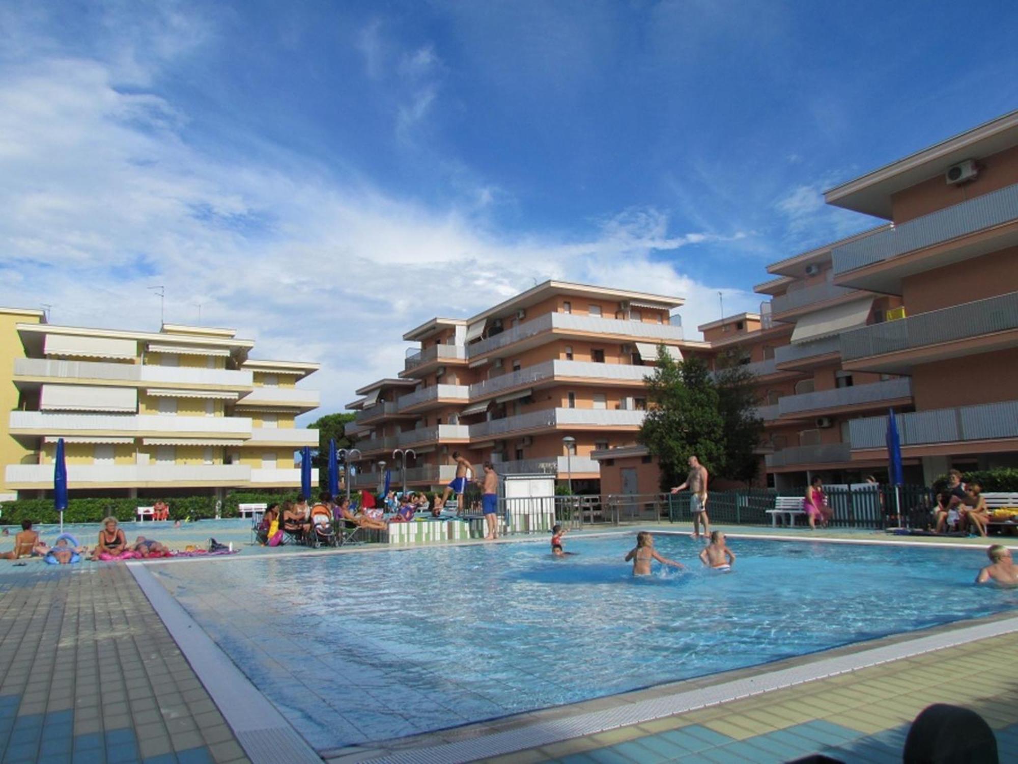 Experience Comfort By The Pool - Beahost Apartment Bibione Exterior photo